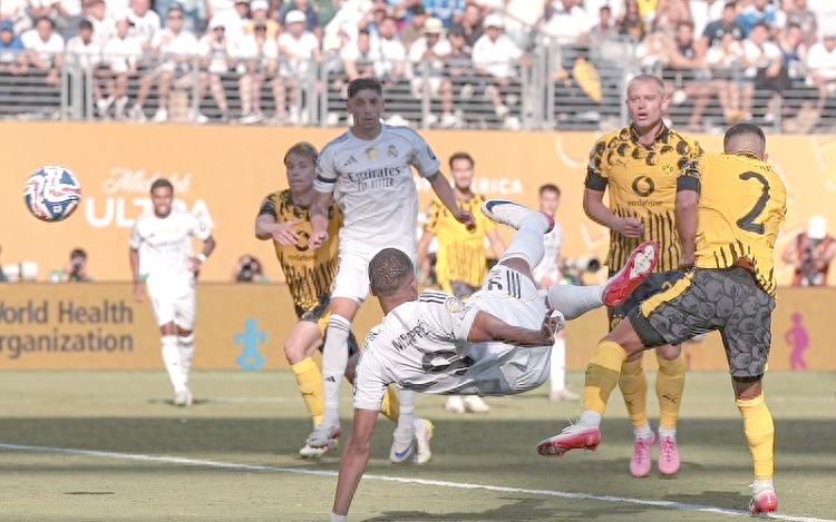 皇家马德里险胜,成功晋级下一轮比赛 皇家马德里险胜,成功晋级下一轮比赛